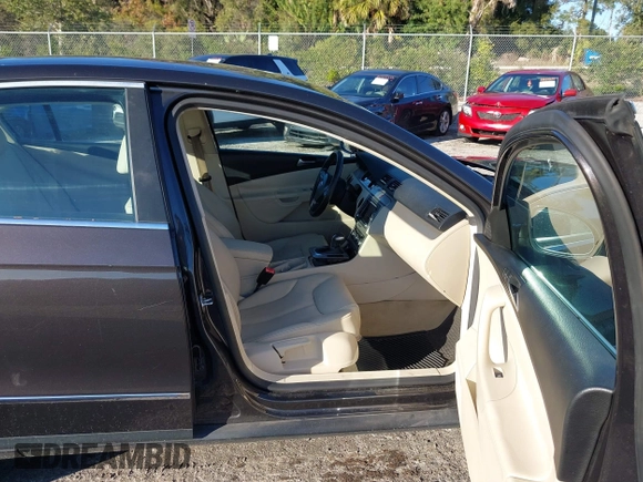 2010 Volkswagen Passat Komfort with VIN WVWJK7AN9AE138884, listed as a IAAI auction lot 38454029 with 97,595 mi miles and . Bid and sale history available at DreamBid. Image 5.
