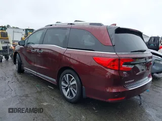 2021 Honda Odyssey Touring with VIN 5FNRL6H88MB006938, listed as a IAAI auction lot 42367022 with 63,280 mi miles and . Bid and sale history available at DreamBid. Image 3.