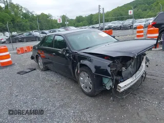 2002 Cadillac DeVille DTS z VIN 1G6KF579320288667, wystawiony jako IAAI lot #42331236 z przebiegiem 71 189 mil mil oraz . Historia ofert i sprzedaży dostępna na DreamBid. Obrazek 1.