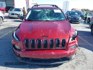2017 Jeep Cherokee Altitude with VIN 1C4PJLABXHW661153, listed as a IAAI auction lot 41058821 with 167,418 mi miles and . Bid and sale history available at DreamBid. Image 13.