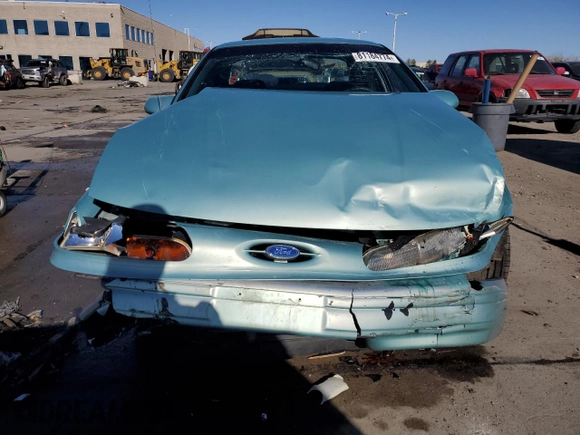 1995 Ford Taurus GL z VIN 1FALP5242SG181625, wystawiony jako Copart lot #81184774 z przebiegiem 107 385 mil mil oraz Szkoda całkowita • Salvage title. Historia ofert i sprzedaży dostępna na DreamBid. Obrazek 5.