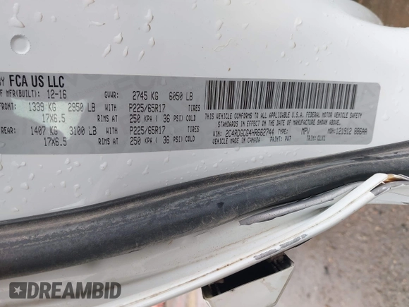 2017 Dodge Grand Caravan SXT with VIN 2C4RDGCG4HR662744, listed as a IAAI auction lot 41910753 with 73,060 mi miles and . Bid and sale history available at DreamBid. Image 9.