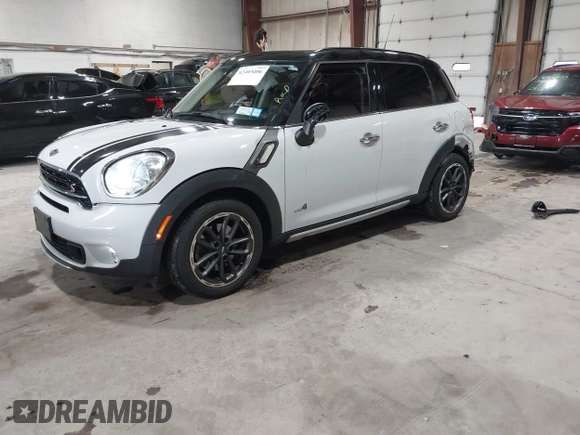 2016 MINI Countryman S with VIN WMWZC5C57GWU20085, listed as a IAAI auction lot 42403406 with 90,592 mi miles and . Bid and sale history available at DreamBid. Image 2.