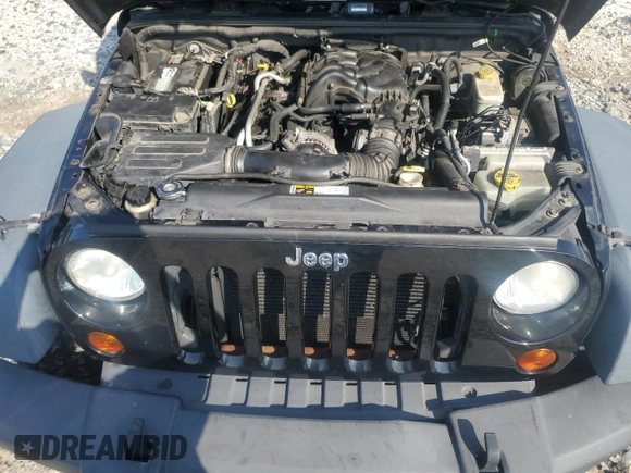 2013 Jeep Wrangler Unlimited Sport with VIN 1C4BJWDG8DL631518, listed as a Copart auction lot 62107765 with 132,617 mi miles and Clean title. Bid and sale history available at DreamBid. Image 12.