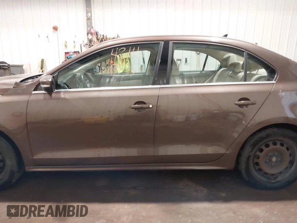 2014 Volkswagen Jetta TDI w/Premium with VIN 3VWLL7AJ1EM358214, listed as a IAAI auction lot 42148435 with 174,923 mi miles and . Bid and sale history available at DreamBid. Image 15.