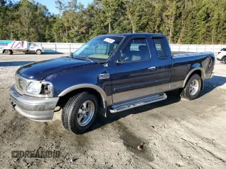 2002 Ford F-150 XL with VIN 1FTRX17L72NA39909, listed as a Copart auction lot 76376994 with 175,926 mi miles and Salvage title. Bid and sale history available at DreamBid. Image 1.