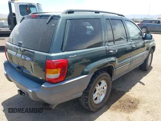 2001 Jeep Grand Cherokee Laredo with VIN 1J4GW48N51C612600, listed as a IAAI auction lot 42348631 with 165,918 mi miles and . Bid and sale history available at DreamBid. Image 4.