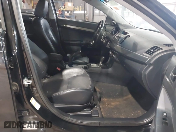 2011 Mitsubishi Lancer GTS with VIN JA32U8FW7BU034390, listed as a IAAI auction lot 41643536 with 130,319 mi miles and . Bid and sale history available at carsss.com. Image 5.
