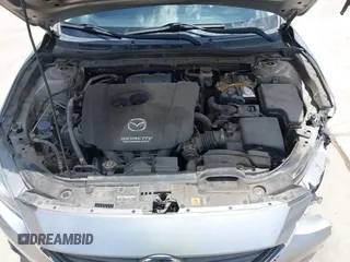 2015 Mazda 3 i Touring z VIN 3MZBM1V73FM144587, wystawiony jako IAAI lot #42422701 z przebiegiem 130 483 mil mil oraz . Historia ofert i sprzedaży dostępna na DreamBid. Obrazek 10.