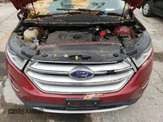 2015 Ford Edge Titanium z VIN 2FMPK4K9XFBB74740, wystawiony jako Copart lot #55529335 z przebiegiem 155 605 mil mil oraz Szkoda całkowita • Salvage title. Historia ofert i sprzedaży dostępna na DreamBid. Obrazek 11.
