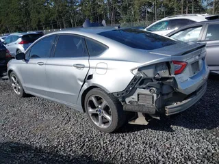 2015 Ford Fusion SE with VIN 3FA6P0H98FR267586, listed as a IAAI auction lot 41987958 with 136,919 mi miles. Bid and sale history available at carsss.com. Image 3.