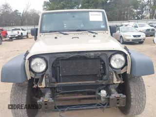 2016 Jeep Wrangler Unlimited Sport with VIN 1C4BJWDG9GL276069, listed as a IAAI auction lot 41618948 with 181,082 mi miles and . Bid and sale history available at DreamBid. Image 13.