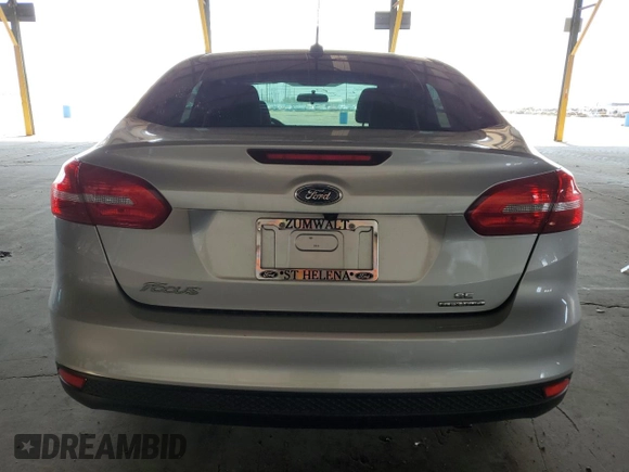 2015 Ford Focus SE with VIN 1FADP3F20FL232196, listed as a Copart auction lot 64829835 with 31,294 mi miles and Salvage title. Bid and sale history available at DreamBid. Image 6.