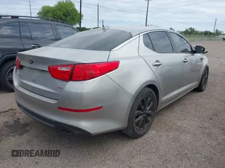 2015 Kia Optima LX with VIN 5XXGM4A70FG443696, listed as a IAAI auction lot 41962823 with 191,533 mi miles. Bid and sale history available at carsss.com. Image 4.