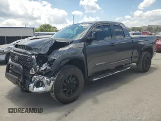 2019 Toyota Tundra SR with VIN 5TFRM5F13KX141745, listed as a Copart auction lot 56910955 with 67,856 mi miles and Salvage title. Bid and sale history available at DreamBid. Image 1.