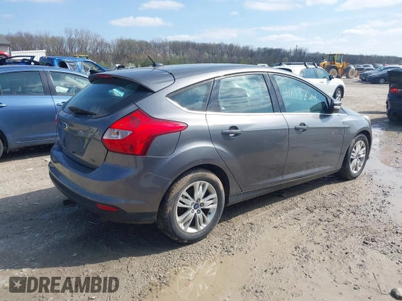 2012 Ford Focus SEL with VIN 1FAHP3M23CL460208, listed as a IAAI auction lot 41893224 with 146,553 mi miles. Bid and sale history available at carsss.com. Image 4.