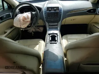 2014 Lincoln MKZ z VIN 3LN6L2G91ER831043, wystawiony jako Copart lot #63109715 z przebiegiem Nie podano mil oraz Szkoda całkowita • Salvage title. Historia ofert i sprzedaży dostępna na DreamBid. Obrazek 8.