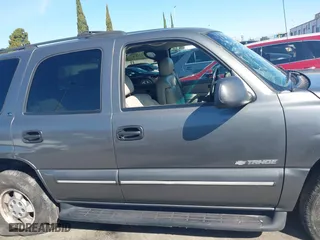 2002 Chevrolet Tahoe LT with VIN 1GNEC13ZX2R224413, listed as a IAAI auction lot 41818623 with 157,509 mi miles. Bid and sale history available at carsss.com. Image 13.