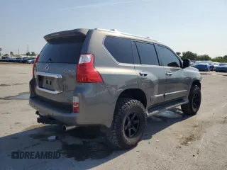 2010 Lexus GX 460 Premium with VIN JTJJM7FX5A5011762, listed as a Copart auction lot 56207715 with 185,360 mi miles and Salvage title. Bid and sale history available at DreamBid. Image 3.