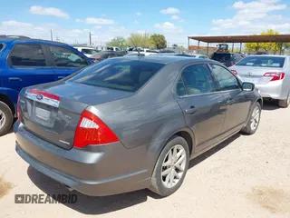 2012 Ford Fusion SEL with VIN 3FAHP0JG6CR307628, listed as a IAAI auction lot 41982612 with 199,602 mi miles. Bid and sale history available at carsss.com. Image 4.