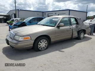 2003 Ford Crown Victoria LX с VIN 2FAHP74W63X124565, выставлен на аукционе Copart как лот 71051034 с пробегом 89 976 миль миль и Списание • Salvage title. История ставок и продаж доступна на DreamBid. Изображение 1.