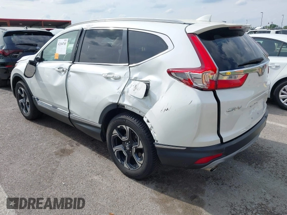 2018 Honda CR-V Touring with VIN 5J6RW2H99JL020598, listed as a IAAI auction lot 42104765 with 30,431 mi miles and . Bid and sale history available at carsss.com. Image 3.