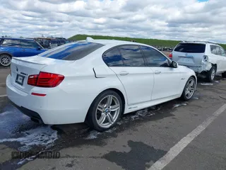 2013 BMW 5 Series 550i with VIN WBAFR9C55DDX79824, listed as a IAAI auction lot 41703036 with 107,166 mi miles and . Bid and sale history available at carsss.com. Image 4.