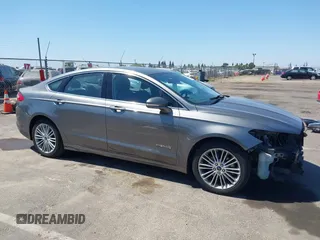 2014 Ford Fusion SE Hybrid with VIN 3FA6P0LU5ER393530, listed as a IAAI auction lot 42478440 with 93,728 mi miles and . Bid and sale history available at DreamBid. Image 14.