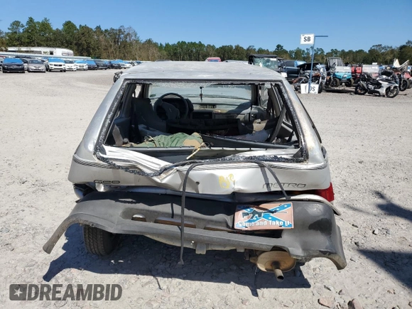 1990 Geo Metro z VIN 2C1MR2466L6018173, wystawiony jako Copart lot #72966054 z przebiegiem 88 980 mil mil oraz Szkody całkowita. Historia ofert i sprzedaży dostępna na DreamBid. Obrazek 6.