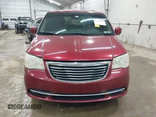 2014 Chrysler Town & Country Touring z VIN 2C4RC1BG9ER438673, wystawiony jako IAAI lot #42360666 z przebiegiem 172 023 mil mil oraz . Historia ofert i sprzedaży dostępna na DreamBid. Obrazek 6.