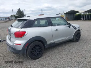 2014 MINI Paceman S z VIN WMWSS7C56EWN72128, wystawiony jako IAAI lot #42131993 z przebiegiem 112 306 mil mil oraz . Historia ofert i sprzedaży dostępna na DreamBid. Obrazek 4.