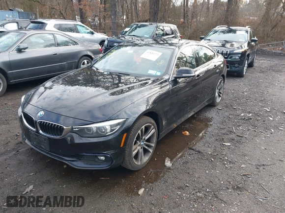 2018 BMW 4 Series 430i xDrive with VIN WBA4J3C56JBG91516, listed as a IAAI auction lot 41824273 with 102,932 mi miles and . Bid and sale history available at DreamBid. Image 18.