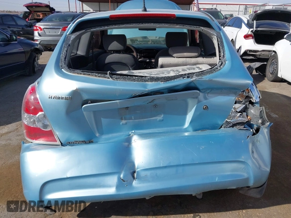 2007 Hyundai Accent GS with VIN KMHCM36C87U025960, listed as a IAAI auction lot 41253249 with 198,074 mi miles. Bid and sale history available at carsss.com. Image 6.