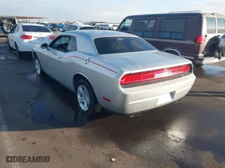 2012 Dodge Challenger SXT with VIN 2C3CDYAG0CH133549, listed as a IAAI auction lot 41368901 with 118,154 mi miles. Bid and sale history available at carsss.com. Image 3.