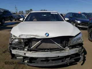 2014 BMW 7 Series 740Li xDrive with VIN WBAYF4C50ED281830, listed as a Copart auction lot 48557035 with 129,497 mi miles and Salvage Title. Bid and sale history available at carsss.com. Image 5.
