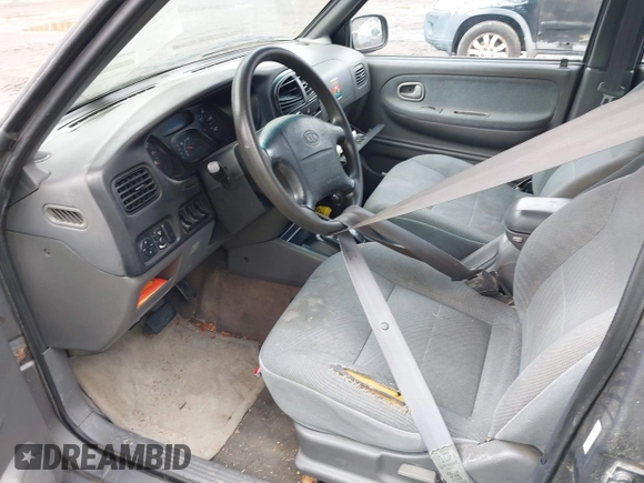 2001 Kia Sportage with VIN KNDJB723515095478, listed as a IAAI auction lot 41823976 with 185,652 mi miles. Bid and sale history available at carsss.com. Image 5.