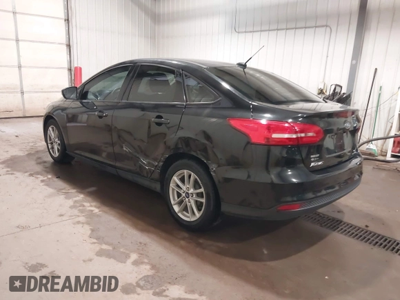 2015 Ford Focus SE with VIN 1FADP3F29FL203084, listed as a IAAI auction lot 42357973 with 99,002 mi miles and . Bid and sale history available at DreamBid. Image 3.