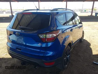 2018 Ford Escape SE with VIN 1FMCU9GDXJUA92416, listed as a IAAI auction lot 41848682 with 97,791 mi miles. Bid and sale history available at carsss.com. Image 4.