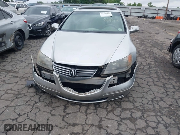 2005 Acura RL с VIN JH4KB16595C017766, выставлен на аукционе IAAI как лот 42209022 с пробегом 225 862 миль миль и . История ставок и продаж доступна на DreamBid. Изображение 6.