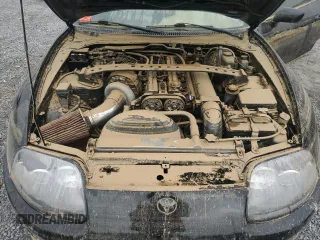 1997 Toyota Supra с VIN JT2DE82A0V0037380, выставлен на аукционе Copart как лот 74052604 с пробегом Не указан миль и Списание • Salvage title. История ставок и продаж доступна на DreamBid. Изображение 11.