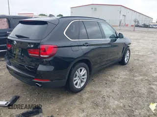 2014 BMW X5 xDrive35i z VIN 5UXKR0C58E0H26011, wystawiony jako IAAI lot #42147773 z przebiegiem 131 173 mil mil oraz . Historia ofert i sprzedaży dostępna na DreamBid. Obrazek 4.