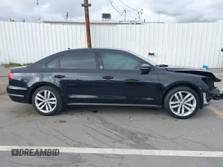 2019 Volkswagen Passat 2.0T Wolfsburg Edition with VIN 1VWLA7A34KC012887, listed as a IAAI auction lot 41792604 with 70,237 mi miles. Bid and sale history available at carsss.com. Image 14.