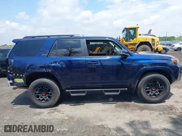 2022 Toyota 4Runner TRD Off Road Premium z VIN JTERU5JR7N6037617, wystawiony jako IAAI lot #42371339 z przebiegiem 35 601 mil mil oraz . Historia ofert i sprzedaży dostępna na DreamBid. Obrazek 14.