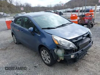 2016 Kia Rio LX with VIN KNADM4A37G6659848, listed as a IAAI auction lot 41853302 with 148,901 mi miles. Bid and sale history available at carsss.com. Image 1.