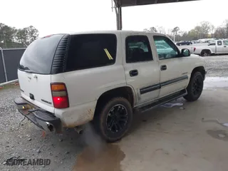 2001 Chevrolet Tahoe LT with VIN 1GNEC13T81J210227, listed as a IAAI auction lot 41847678 with 327,531 mi miles. Bid and sale history available at carsss.com. Image 4.