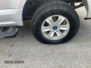 2018 Ford F-150 XL with VIN 1FTFW1E52JKF43228, listed as a IAAI auction lot 42195644 with 999,999 mi miles. Bid and sale history available at carsss.com. Image 5.