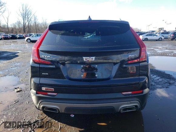 2021 Cadillac XT4 AWD Premium Luxury with VIN 1GYFZDR47MF023253, listed as a Copart auction lot 86620904 with 36,712 mi miles and Salvage Title. Bid and sale history available at carsss.com. Image 6.