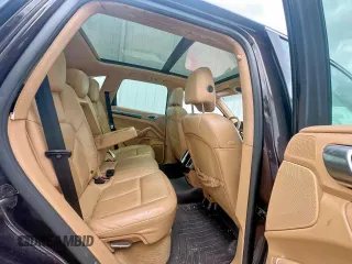 2014 Porsche Cayenne z VIN WP1AA2A25ELA97360, wystawiony jako Copart lot #59060675 z przebiegiem 181 114 mil mil oraz Tytuł czysty. Historia ofert i sprzedaży dostępna na DreamBid. Obrazek 6.