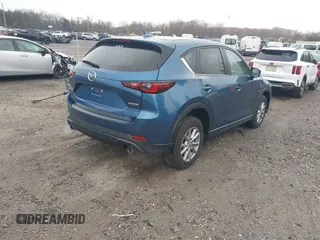 2023 Mazda CX-5 S Carbon Edition z VIN JM3KFBCM4P0264891, wystawiony jako IAAI lot #40933700 z przebiegiem 18 714 mil mil oraz . Historia ofert i sprzedaży dostępna na DreamBid. Obrazek 4.