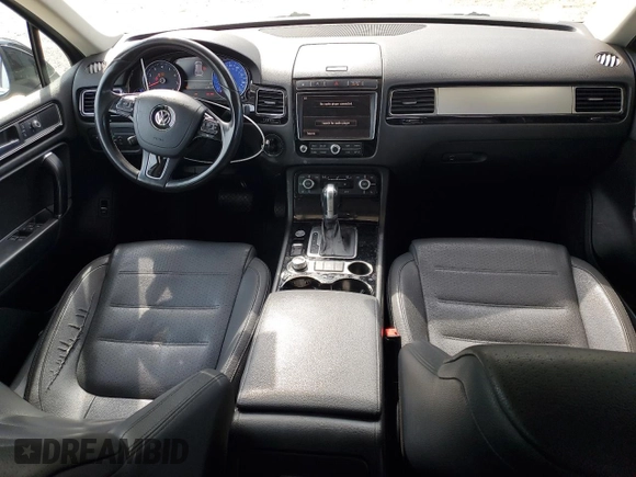 2016 Volkswagen Touareg Sport with VIN WVGEF9BP3GD007543, listed as a Copart auction lot 52806715 with 121,404 mi miles and Salvage Title. Bid and sale history available at DreamBid. Image 8.